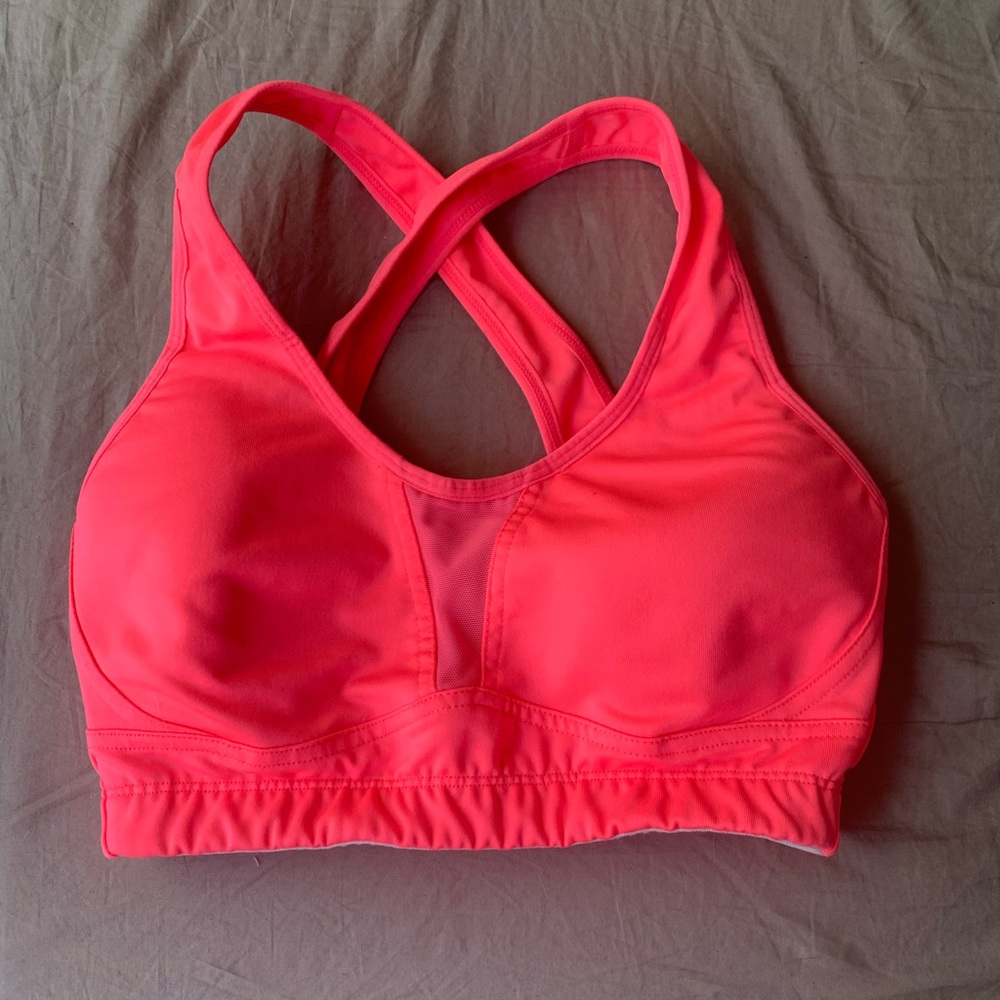 Hot pink Saucony sports bra